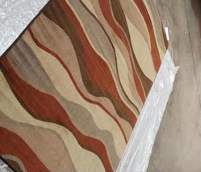 clean red and beige rug at SERVPRO of Southeast Memphis warehouse